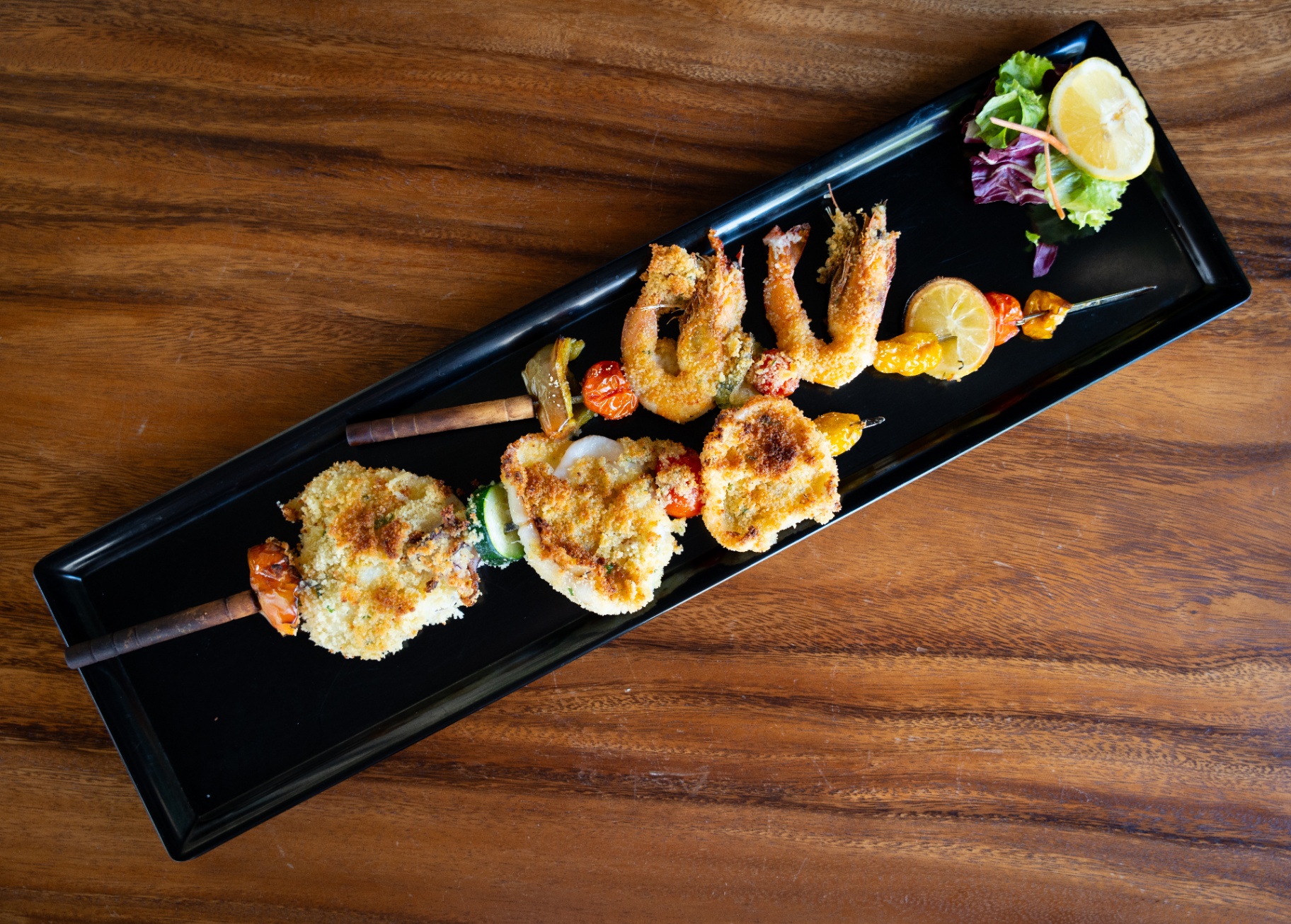 Spiedini di mare gratinati